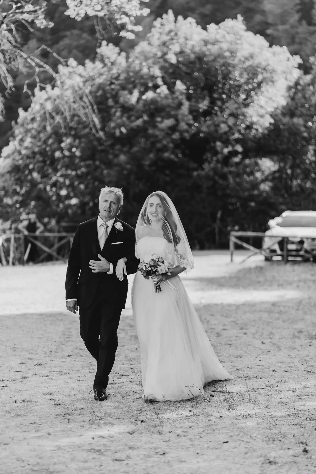 Bride dad walking san pietro valle abbey grounds